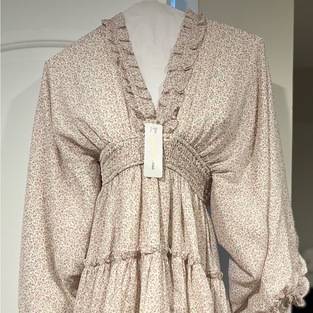Cute spring/ summer dress.  Long flowing sleeves.